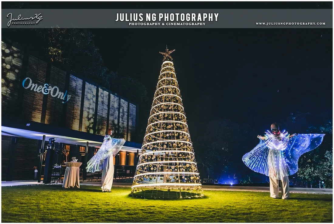 New Year's Eve countdown party at One&Only Desaru Coast with illuminated performers and festive entertainment photography.