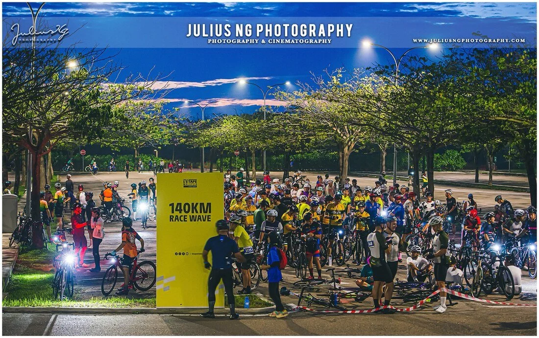 Cyclists gathering at the 140KM race wave start during L'Étape Malaysia by Tour de France in Desaru Coast, captured by Julius Ng Photography.