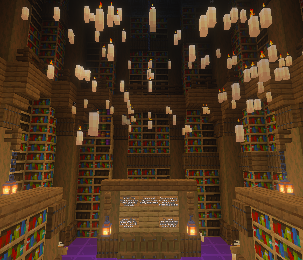 A virtual library in Minecraft with tall bookshelves, illuminated by hanging candles and wall lamps, and adorned with a front desk area with a sign, two hanging lanterns, and a purple floor.