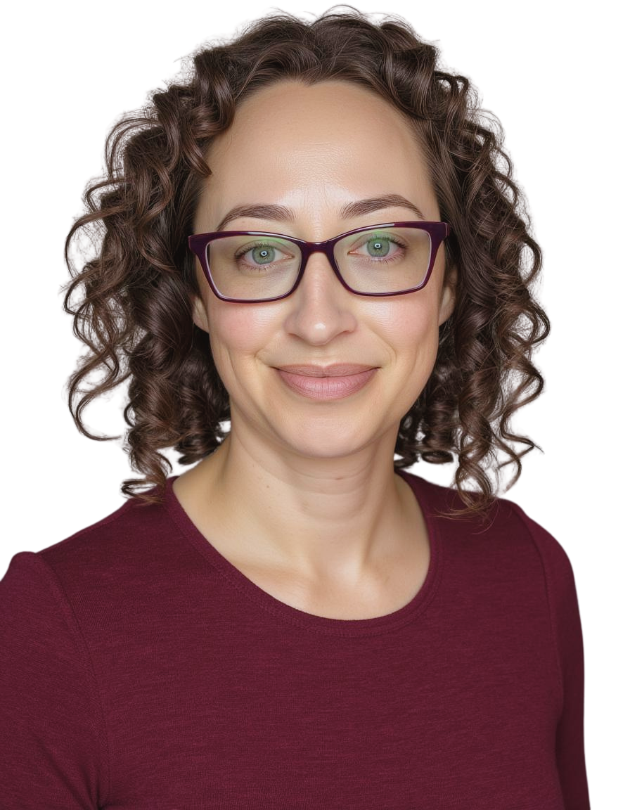 Anna Louise, smiling, with shoulder-length curly brown hair and plum-coloured glasses, wearing a burgundy top.