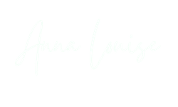 Stylized white cursive text reading 'Anna Louise' on a deep plum background.