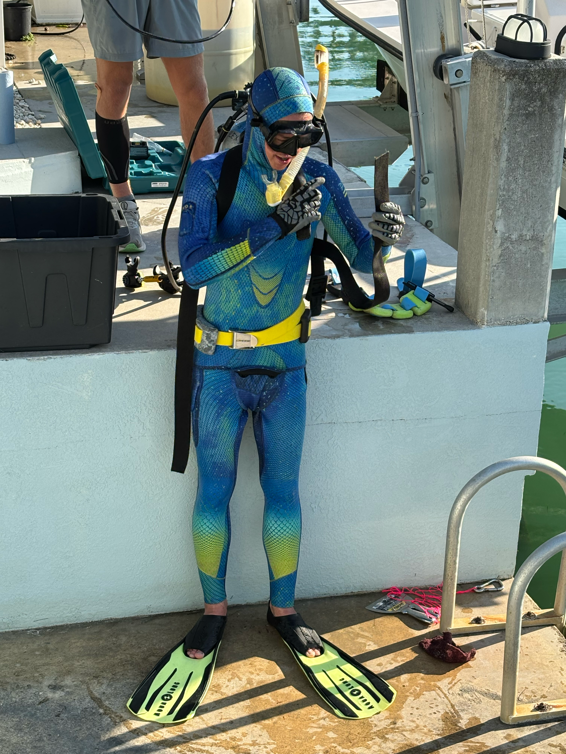 Tony gearing up in his scuba gear for a long day of work.
