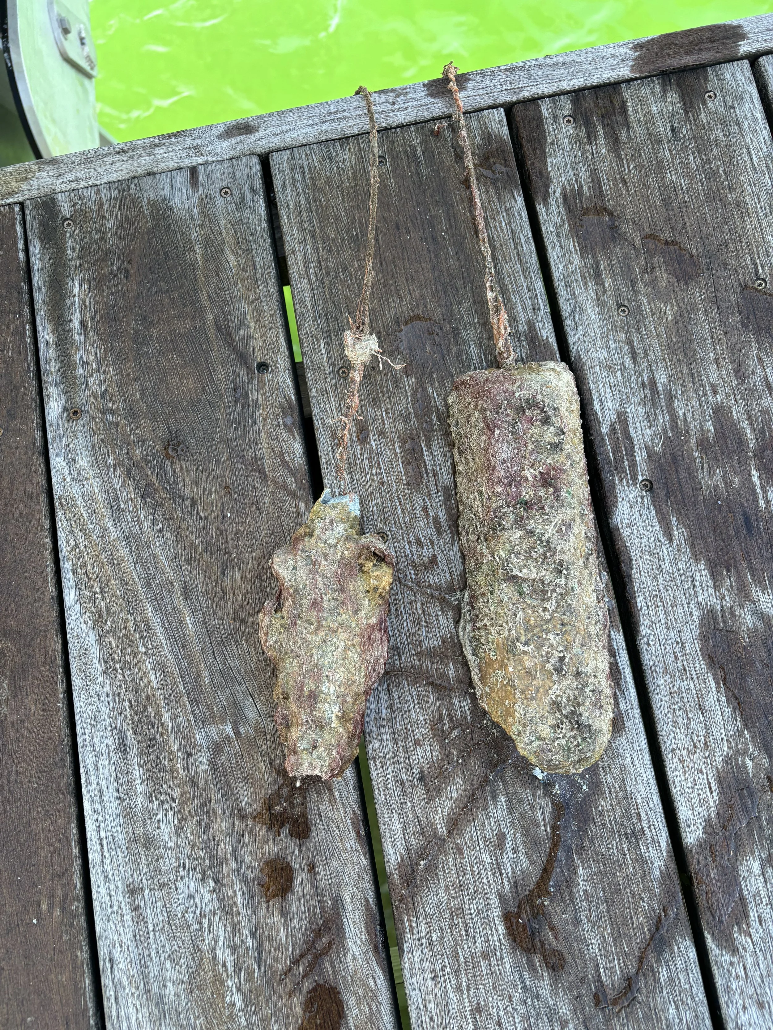 Boat lift zinc anodes before cleaning.