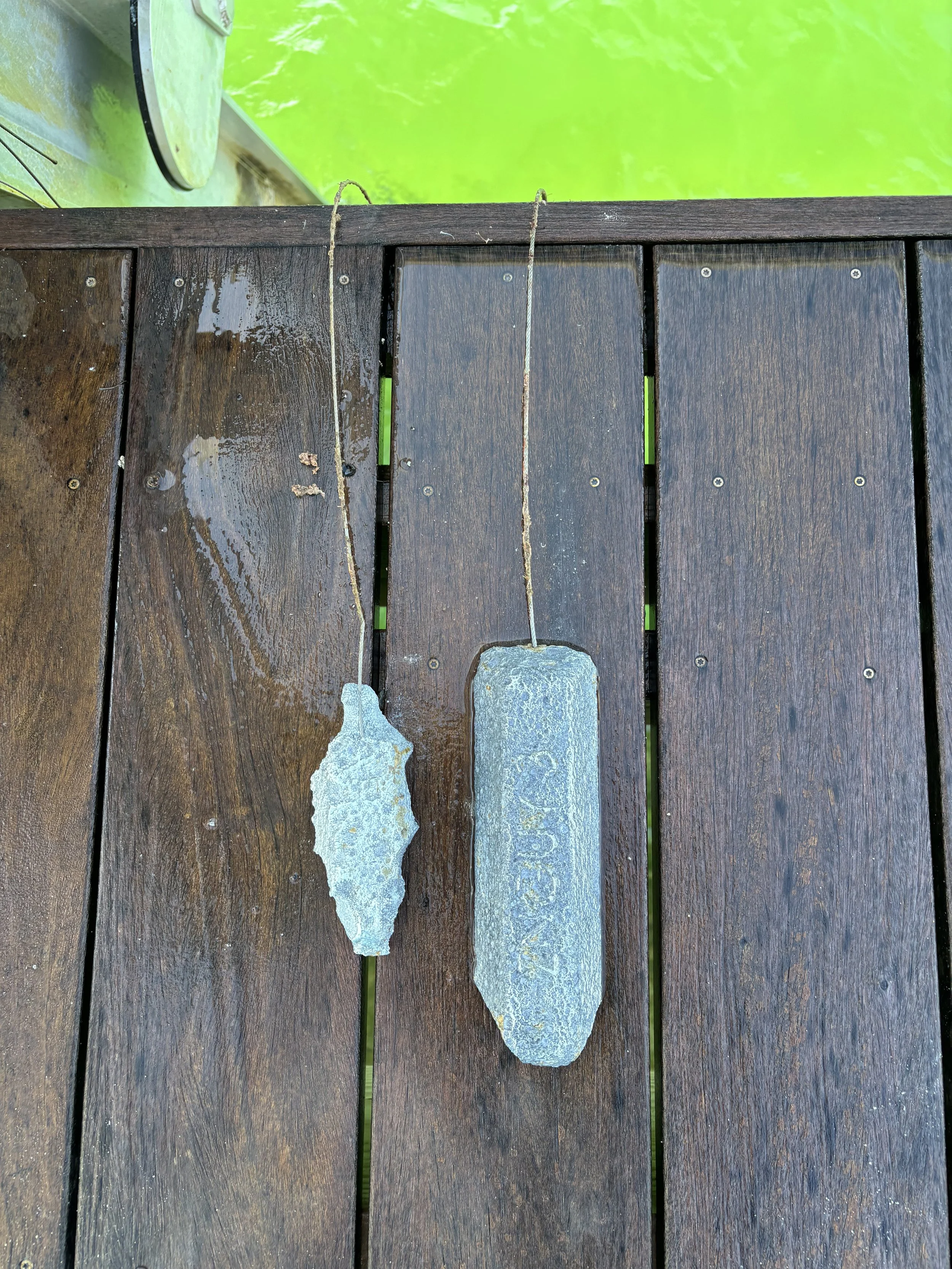 Boat lift zinc anodes after cleaning.