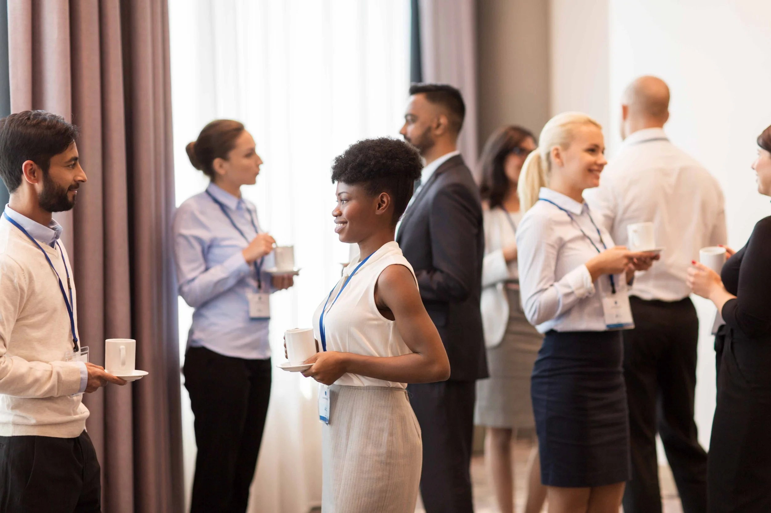 business-people-networking-at-a-corporate-event-2026-03-09-07-59-55-utc.jpg