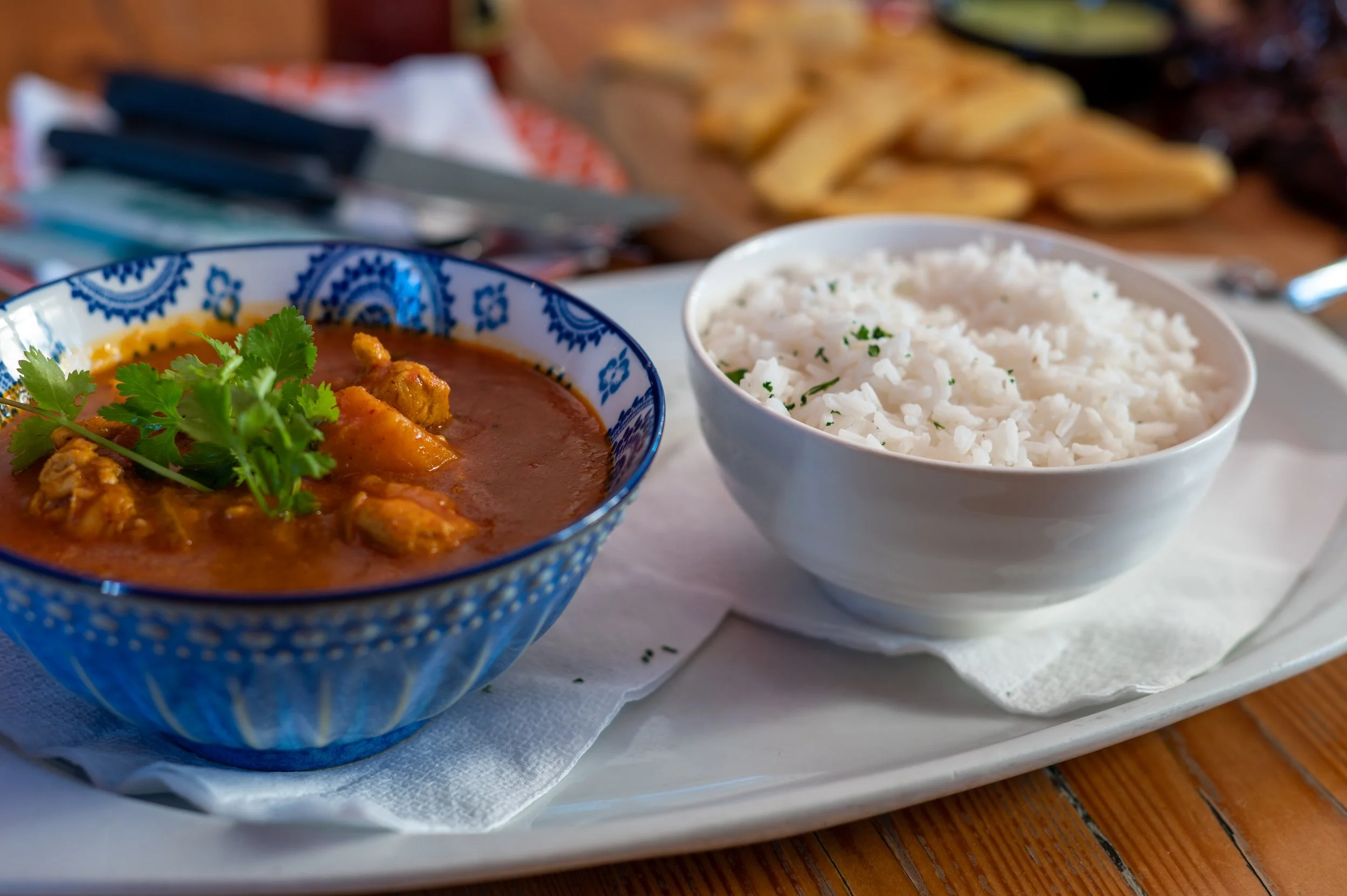 thai-curry-and-rice-seen-inside-bowl-2023-11-27-05-15-13-utc.jpg