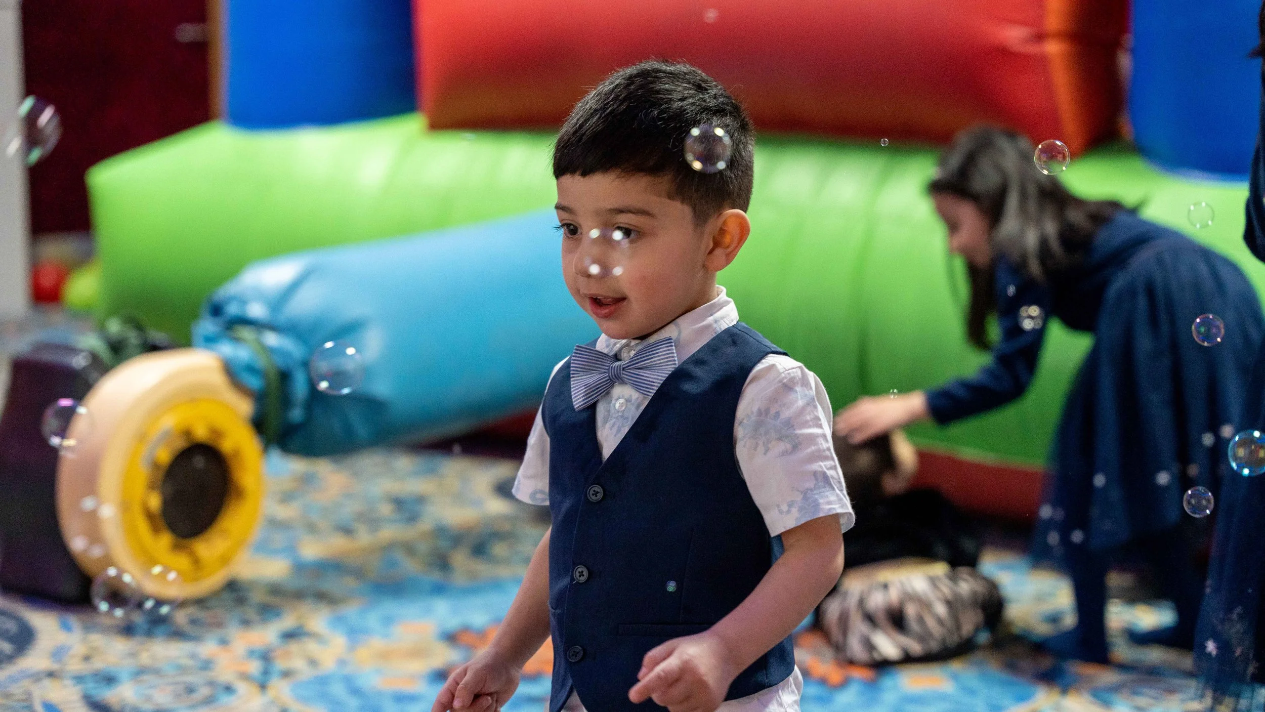 Playing with bubbles at child's birthday party
