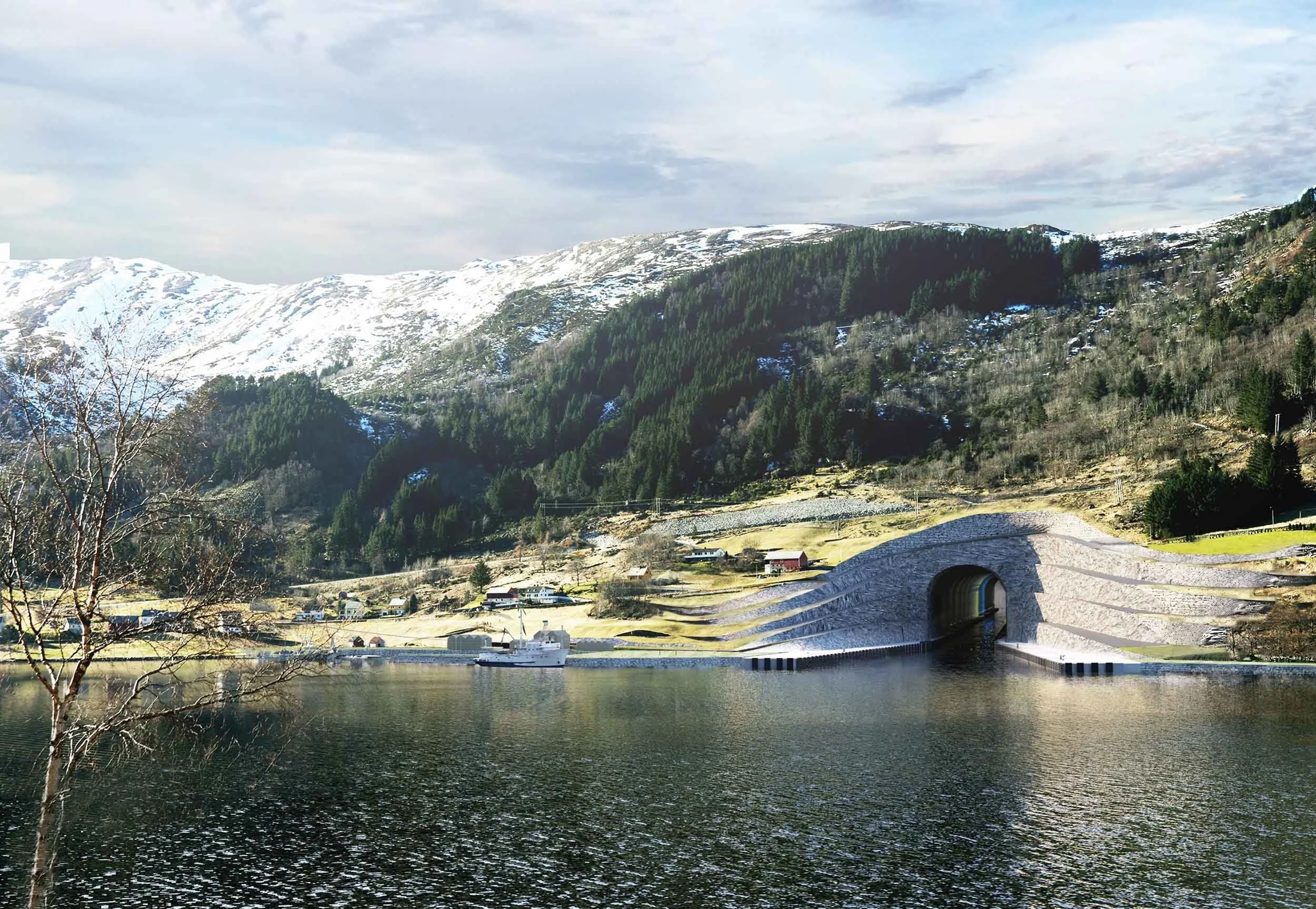 Bilde av en innsjø med fjell og skog i bakgrunnen, snødekke på fjelltoppene og en liten bro over vannet.