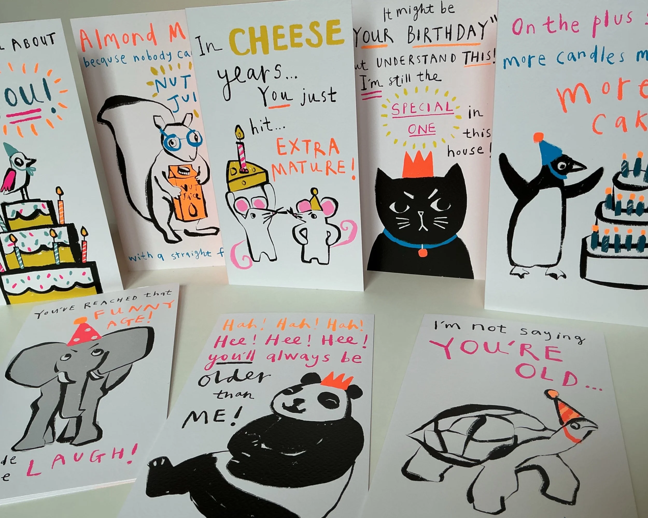 Eight cards available in Tesco. Hand drawn animals with black outlines. Hand letteriing. Illustrated by Kate Jenkins.