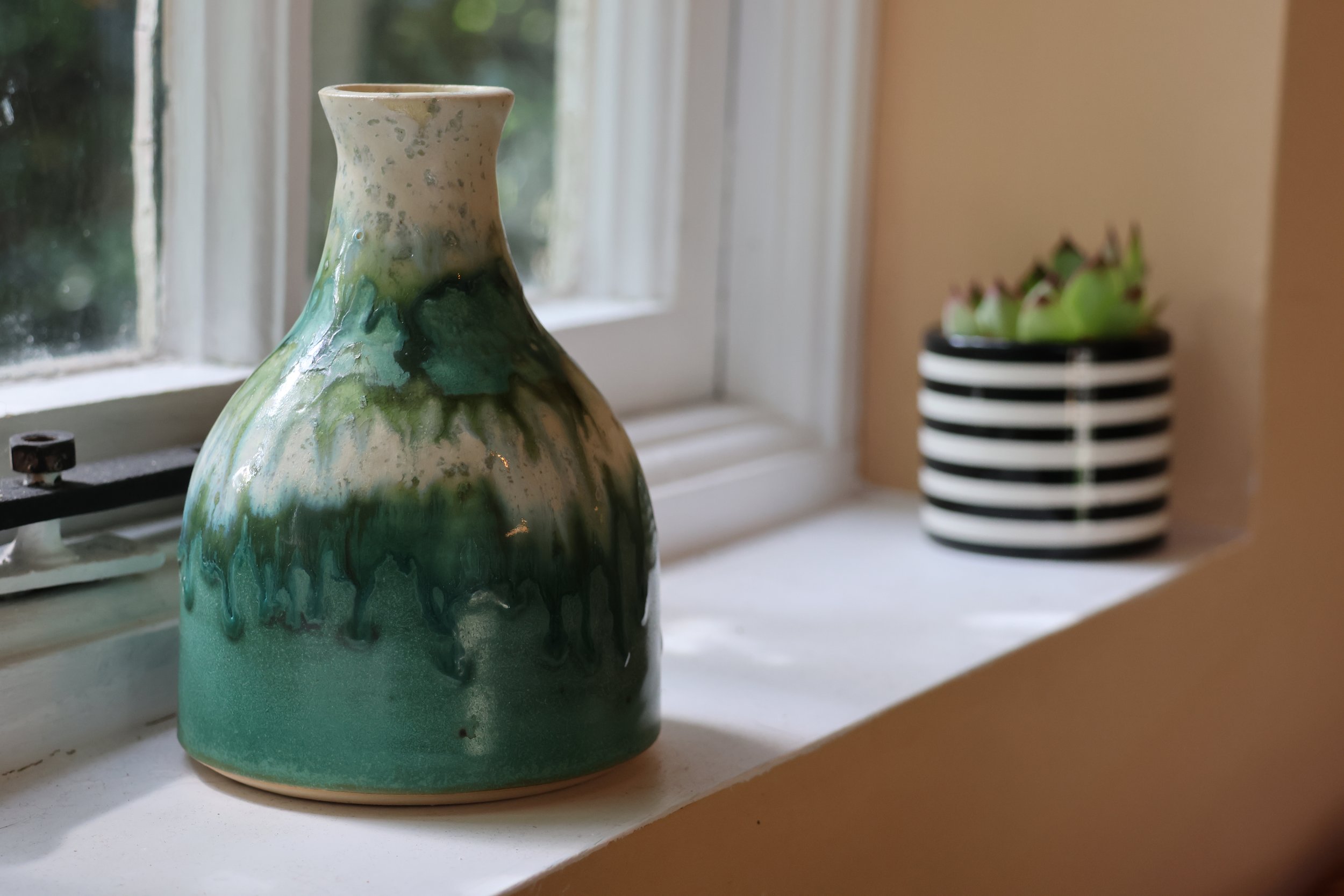 Ceramic vase on the windowsill of the therapy room, Cedarwood Therapy