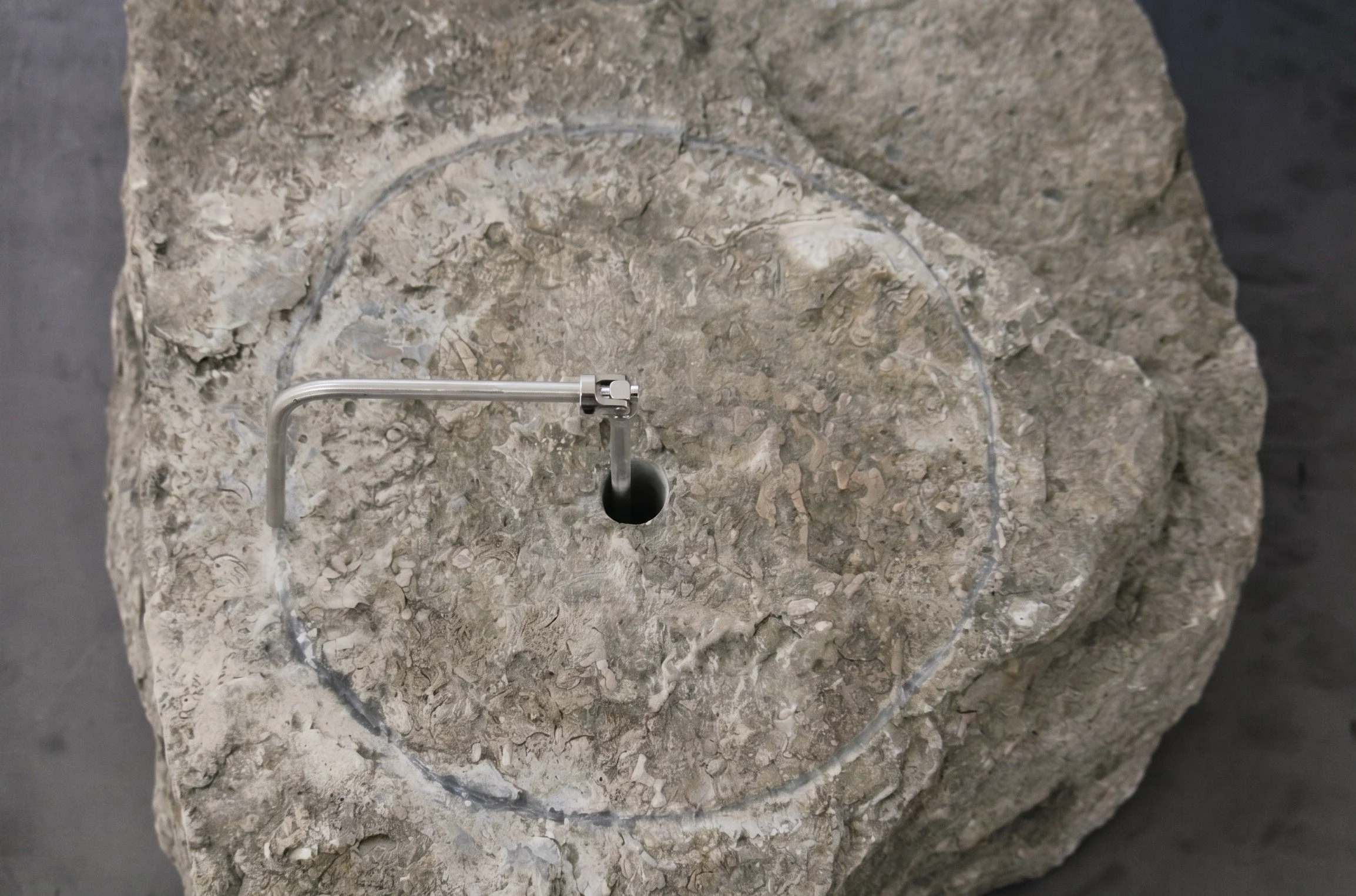 Empreinte de la puissance (Imprint of Power​)(details)​, 2023​. Steel, rock, and motor​ ― 38 × 24 × 15 in