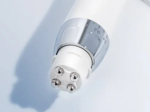Electroporation is a technique in which an electrical field is applied to cells in order to increase the permeability of the membranes, allowing products to be introduced into the cell more efficiently. 

Its application to the skin has been shown to