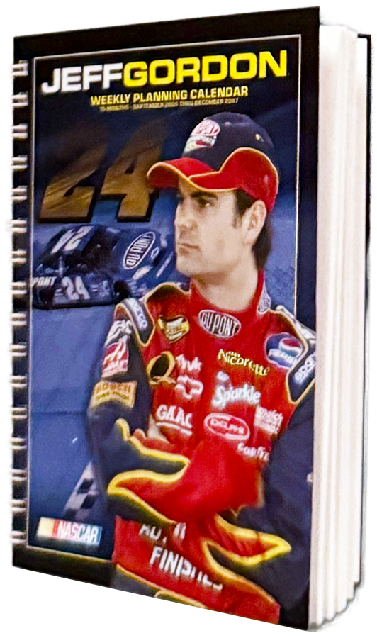 Cover of Jeff Gordon's weekly planning calendar featuring a portrait of Jeff Gordon in his racing suit, with a racing car in the background.