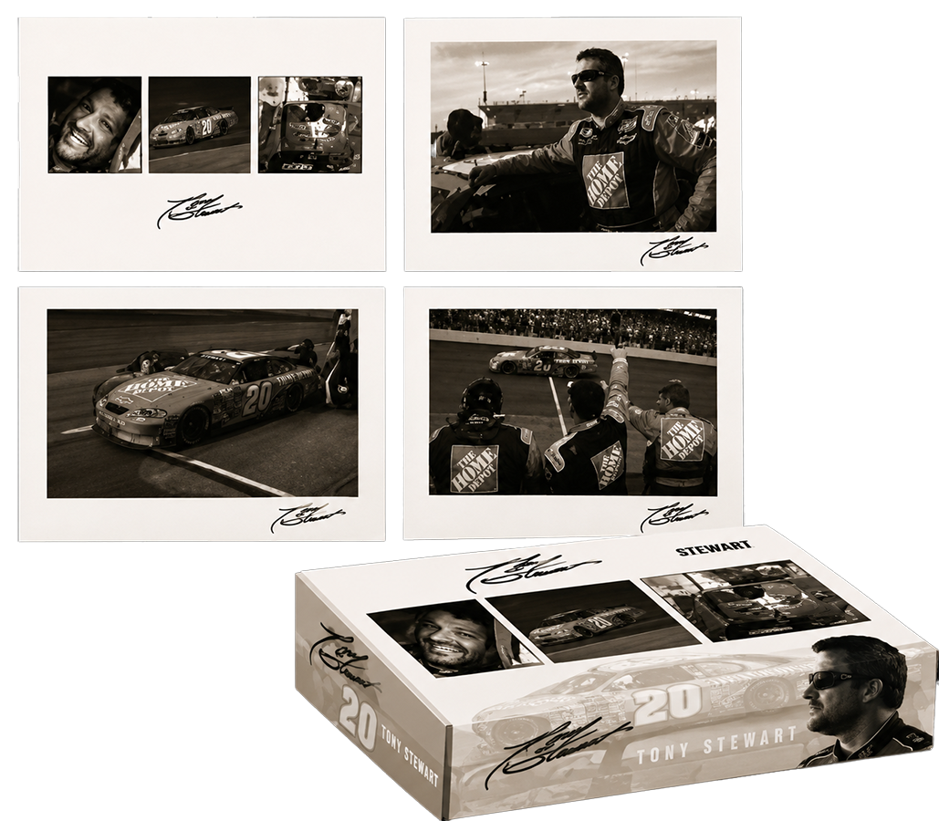Collection of black and white photographs of race car driver Tony Stewart, racing cars, and team members at a race track. The photos are displayed on a wall and in a custom box featuring Stewart's name and signature.