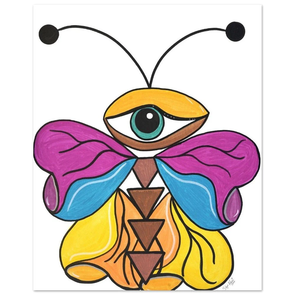Colorful butterfly with a single eye in the center of its face, yellow, purple, blue, and orange wings, and antennae with black tips.
