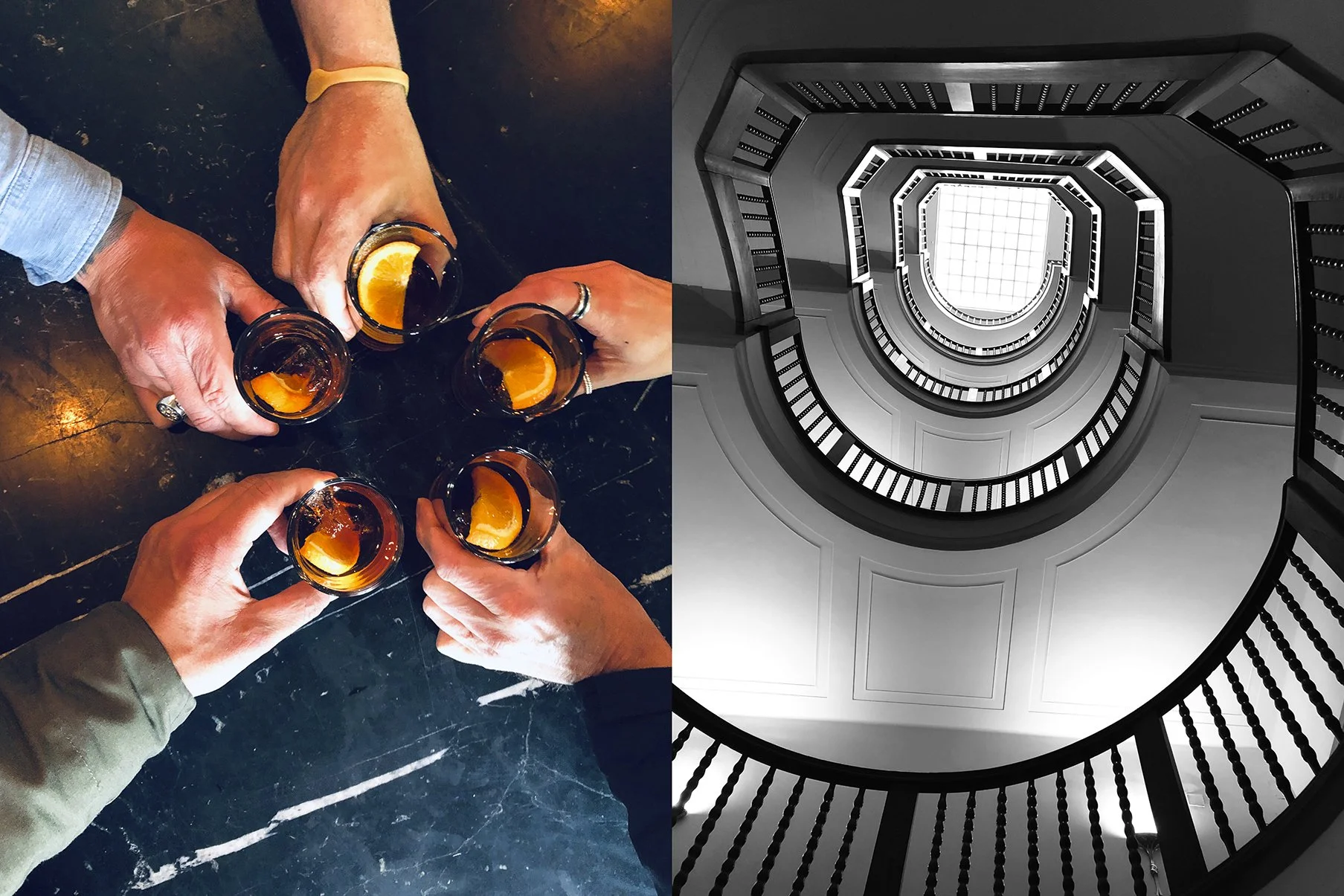 Auf der linken Seite des Bildes sehen wir sechs Hände, die Gläser mit einem dunklen Getränk und einer Orangenscheibe darauf heben, darunter ein dunkler, marmorierter Tisch. Auf der rechten Seite ist eine spiralförmige Treppe in schwarz-weiß zu sehen, die nach oben führt.