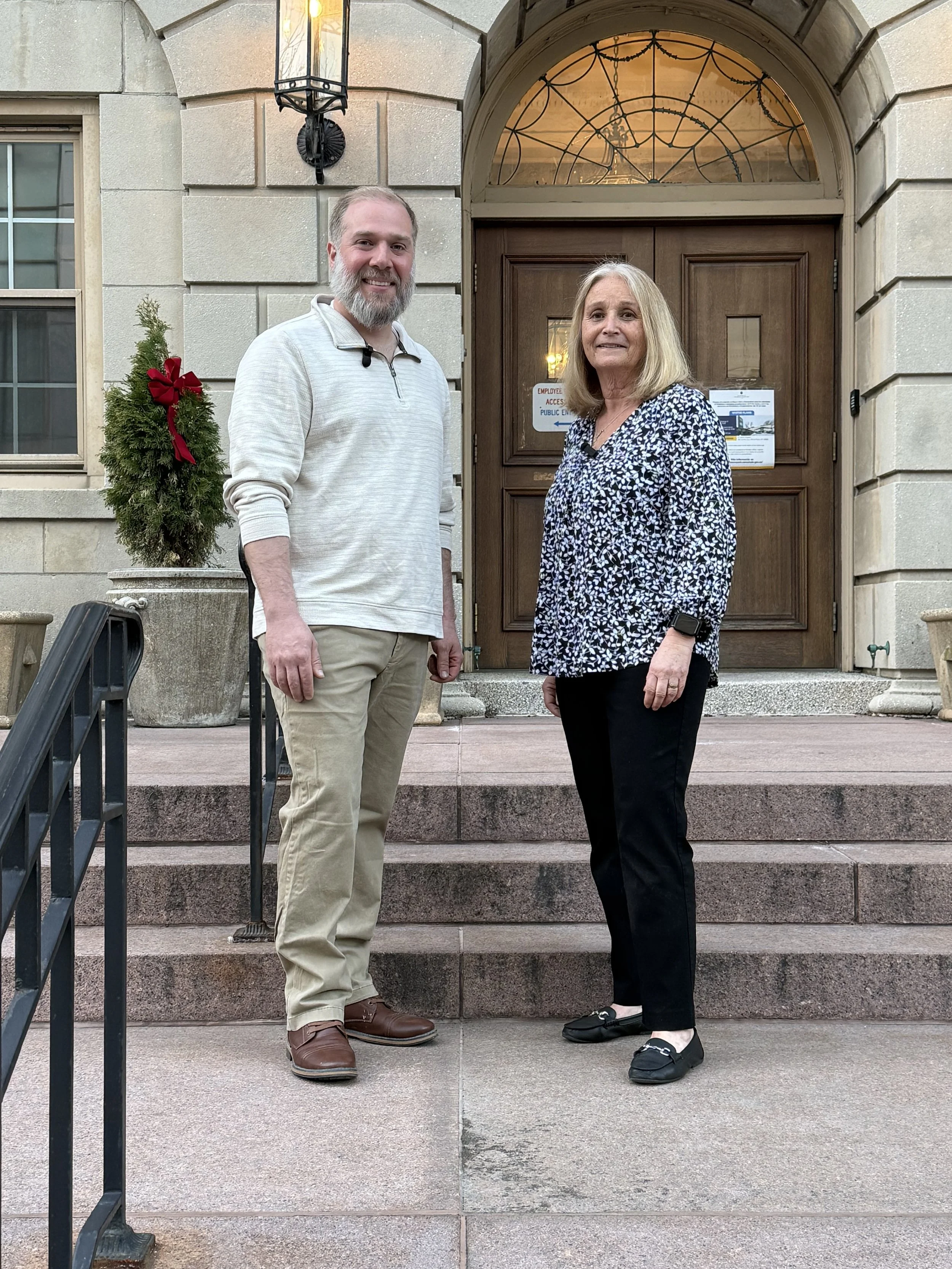 John Cambareri and Kathy Guglielmo, candidates for White Plains Common Council standing on the steps of City Hall.