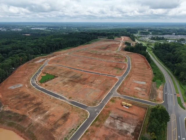 Open field with paved roads