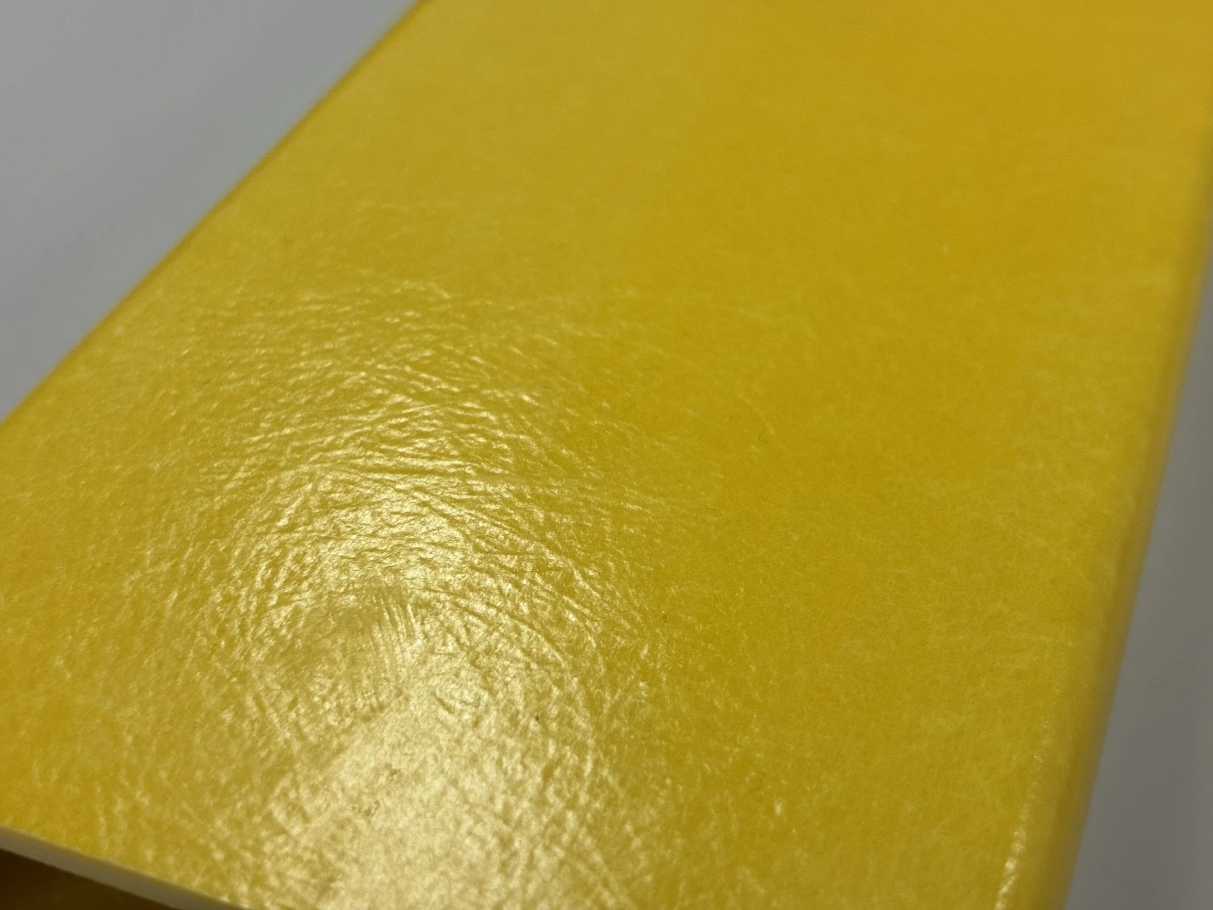 Smooth resin-rich outer surface on a pultruded glass fibre composite profile