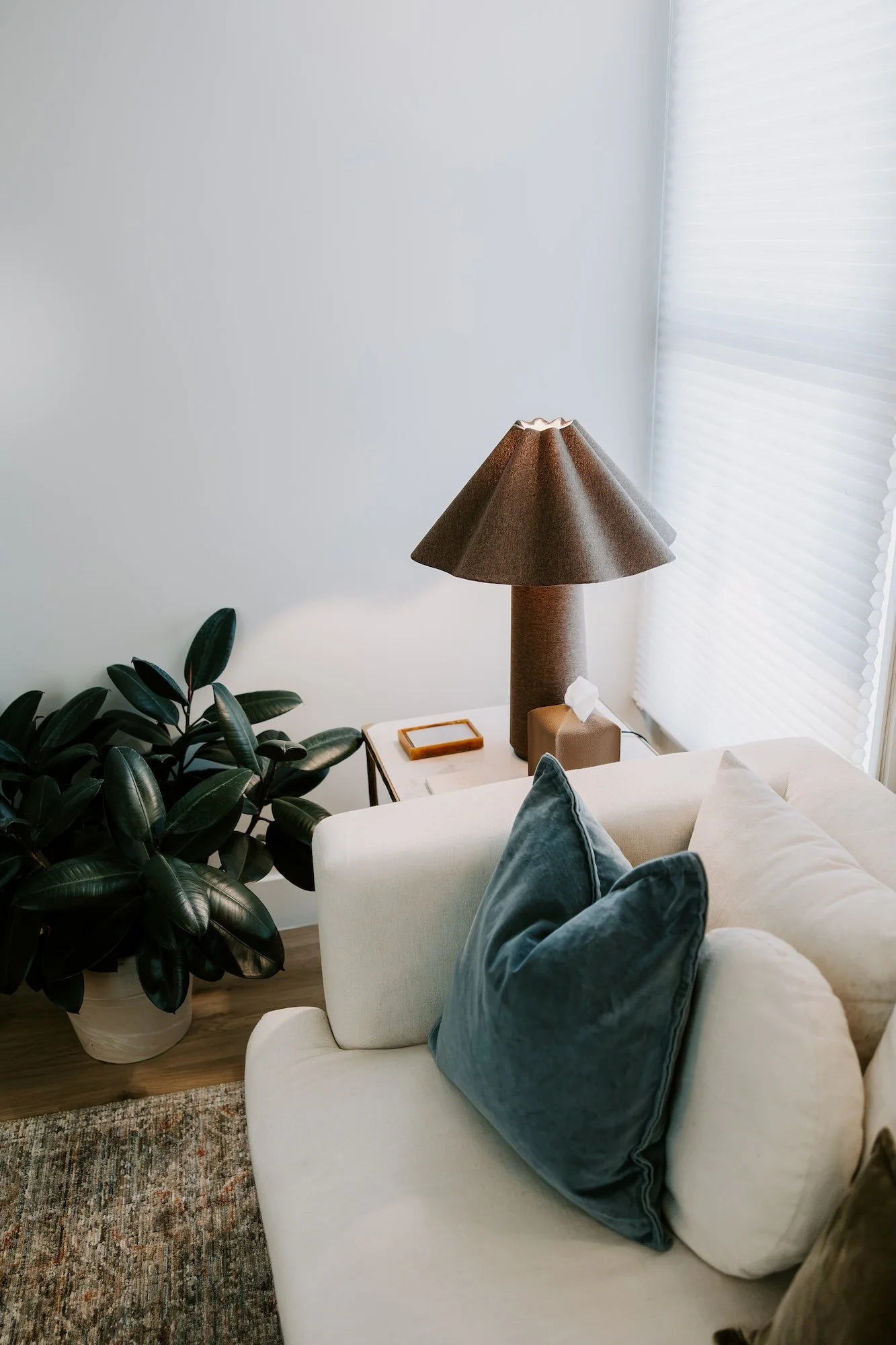 Comfortable therapy office with warm, calming furnishings.