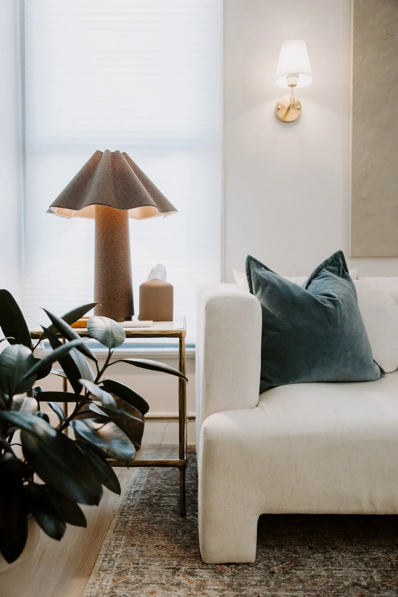 Warm and inviting therapy office with comfortable seating, soft ambient lighting, and natural accents in Denver, CO