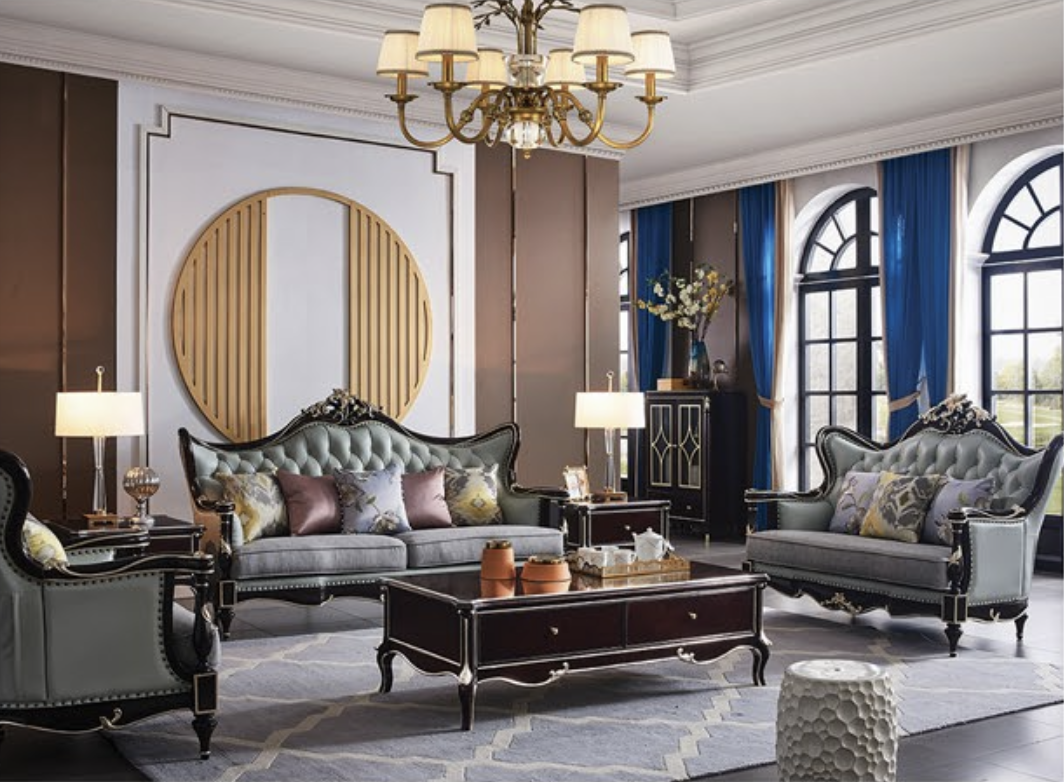 Elegant living room with ornate furniture, large arched windows with blue curtains, a chandelier, and decorative wall art.