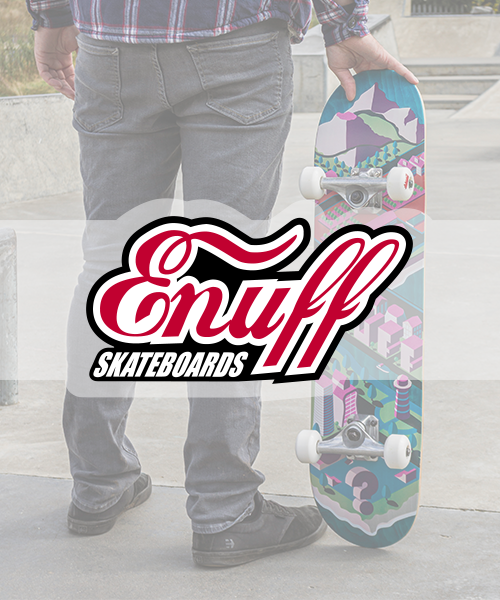 Person in jeans holding a skateboard with colorful, geometric and mountain designs, skateboard brand logo Enuff Skateboards overlayed.