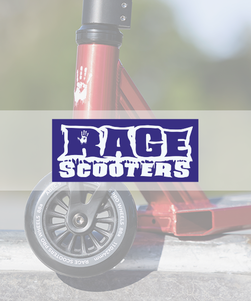 Close-up of a red Rage Scooters kick scooter with a logo displaying a white handprint and the words 'RAGE SCOOTERS' on a purple background.