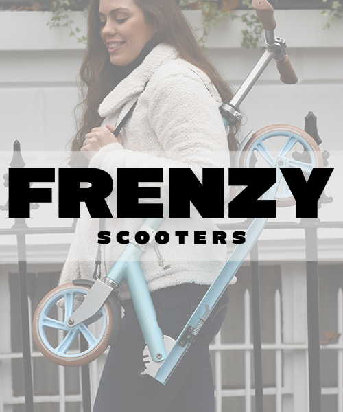 Young woman carrying a light blue and brown FRENZY folding scooter on her back, smiling, outdoors in front of a white fence.