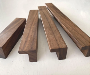 Solid walnut strips for handcrafted sideboard drawer pulls