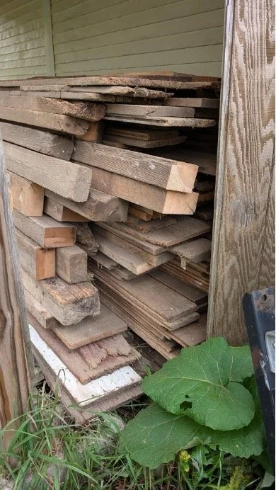 Reclaimed century-old barnwood boards for sideboard construction