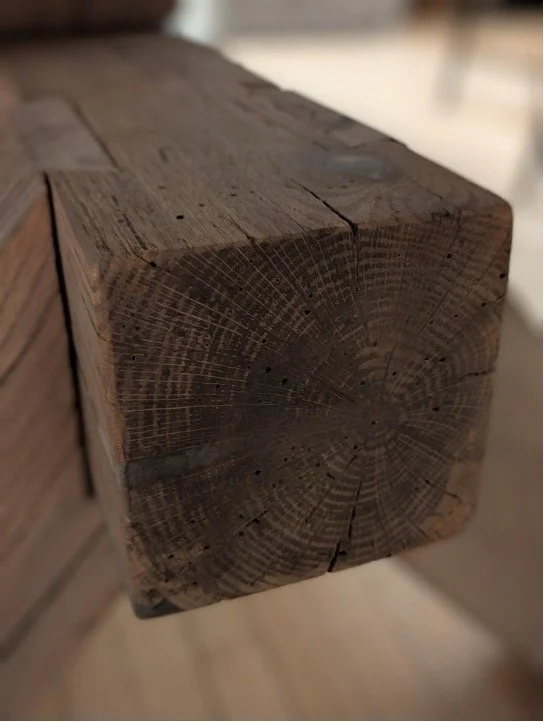 Century-old reclaimed oak barn timber for table base
