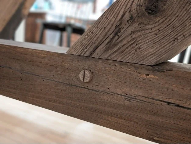 Pinned mortise-and-tenon joint in oak table base