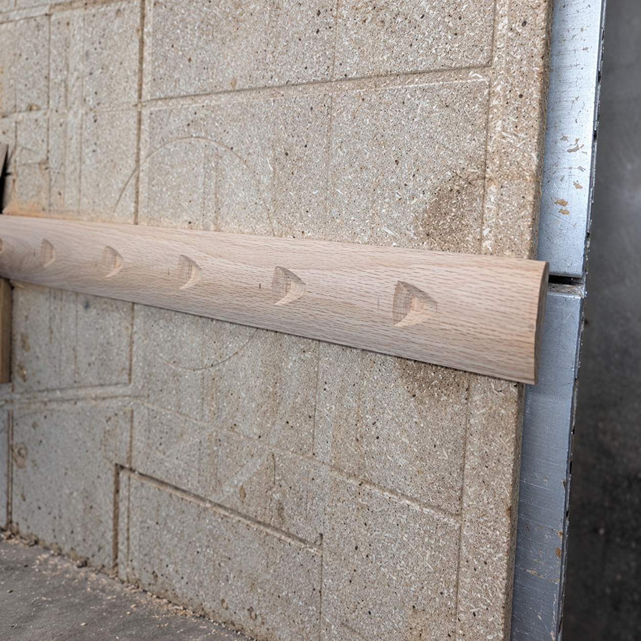 Decorative routed details cut into the custom oak apron for the bed-to-bench conversion.