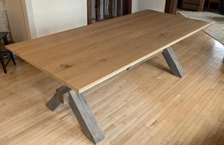 Completed white oak dining table with reclaimed timber base
