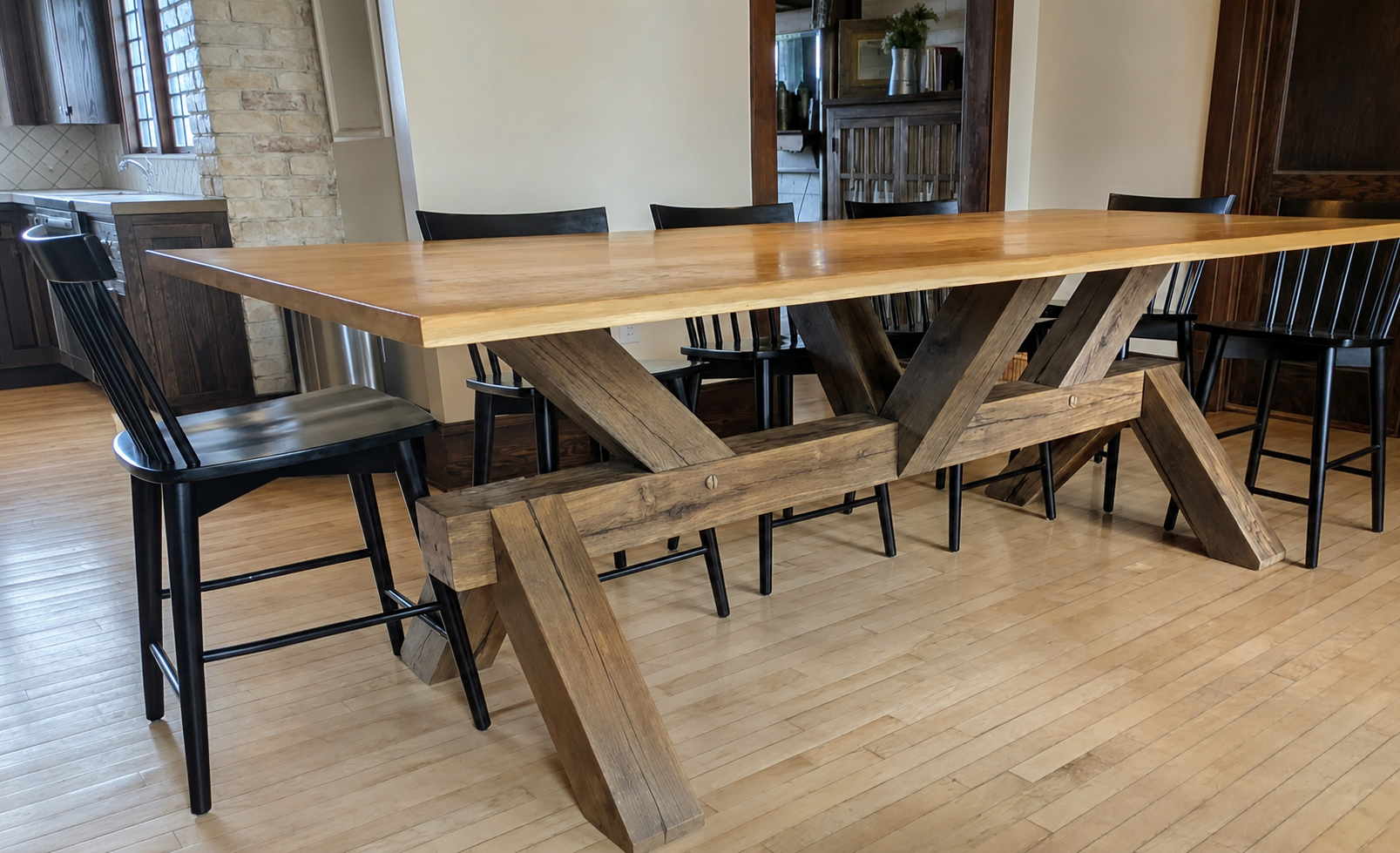 Nine-foot oak trestle table with seating for family dining