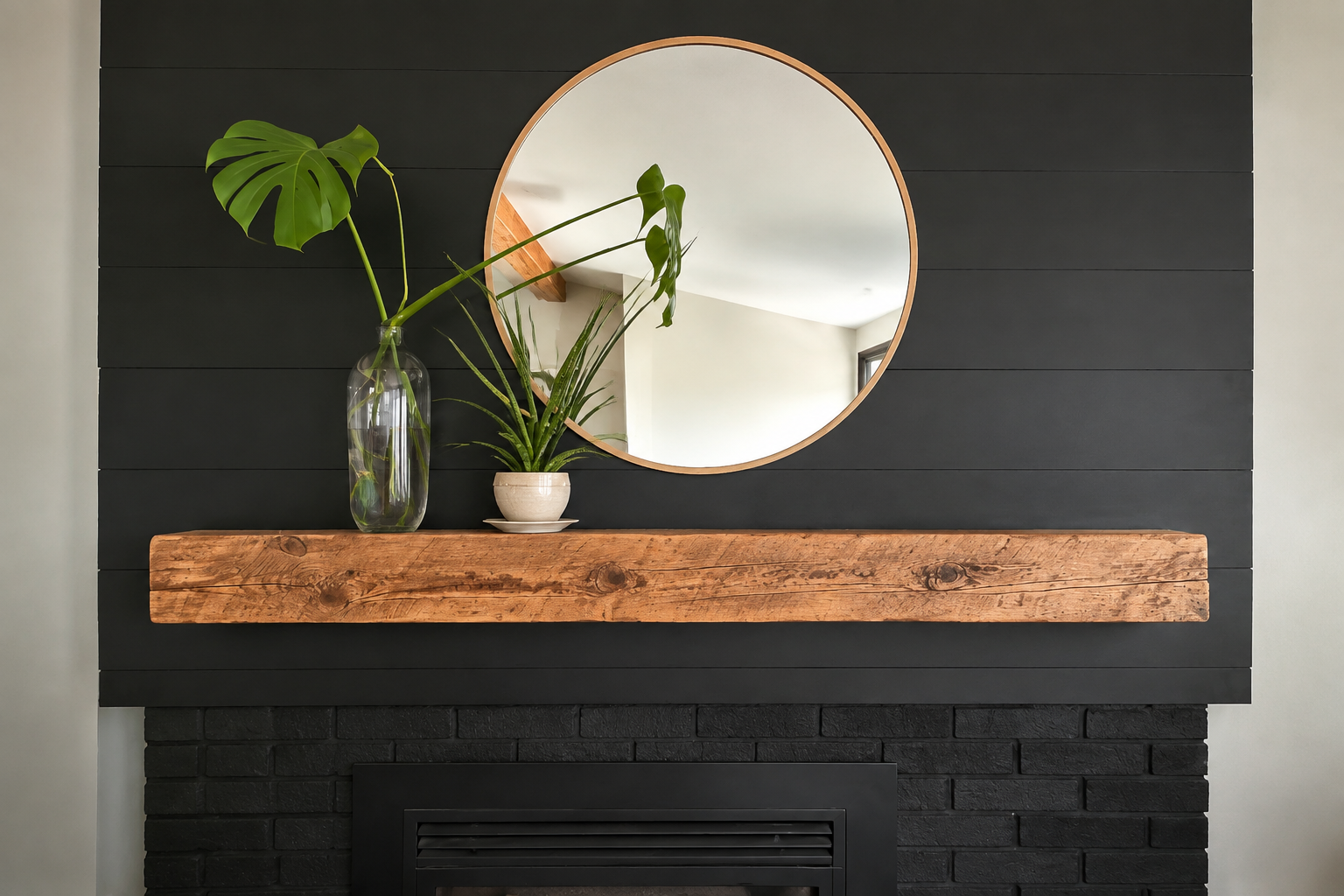 Live-edge wood fireplace mantel on black shiplap wall