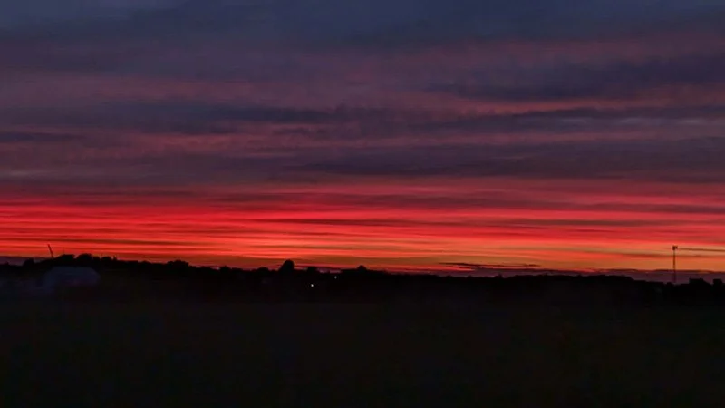 Red sunset over the Wisconsin hill where Phil's workshop is located