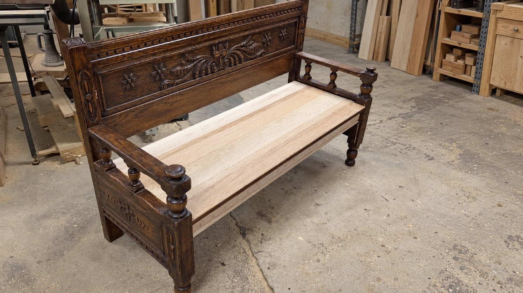 Antique bed components assembled into a bench with the newly constructed oak seat before staining.