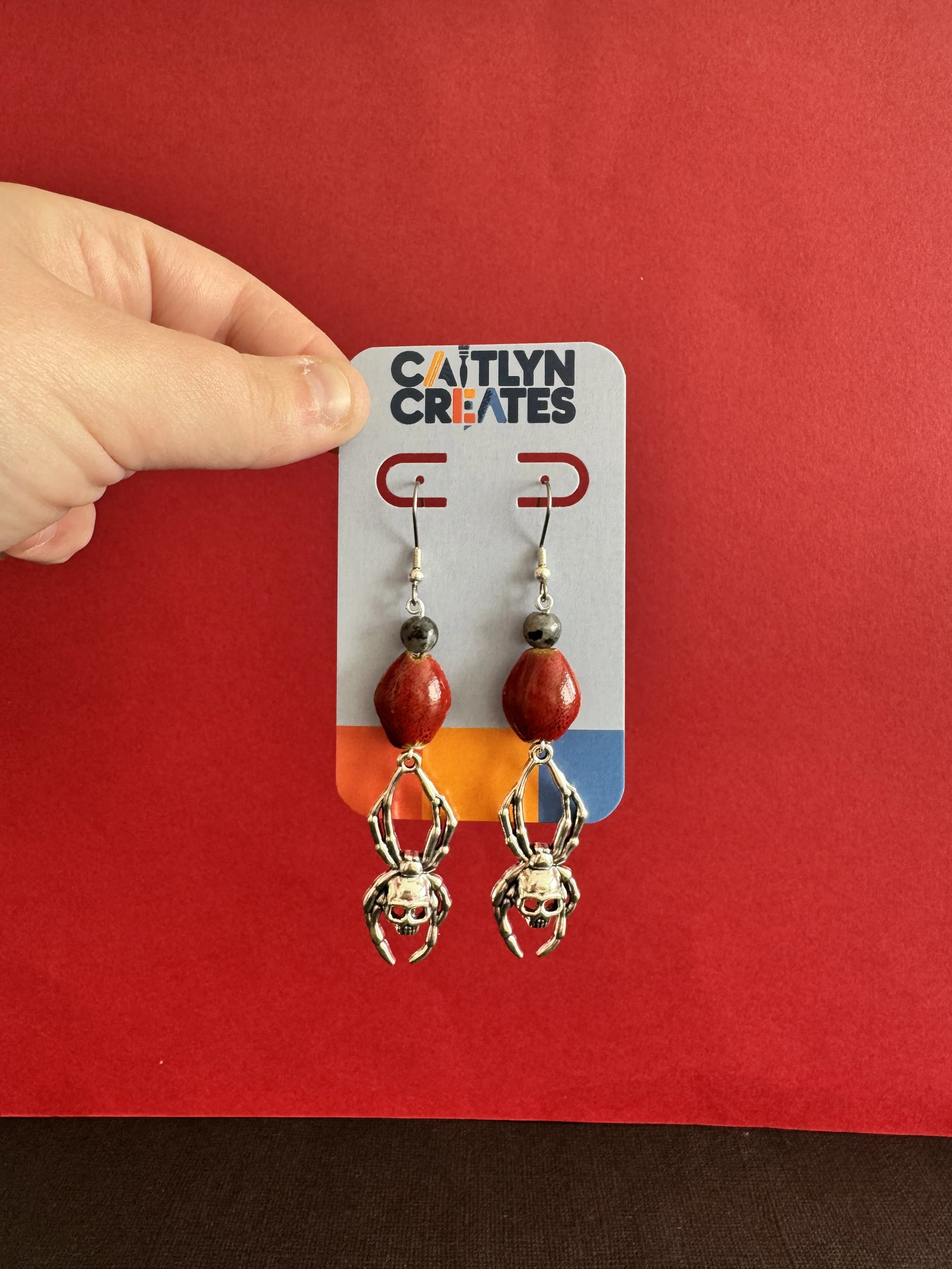 Skully Earrings 2.JPG