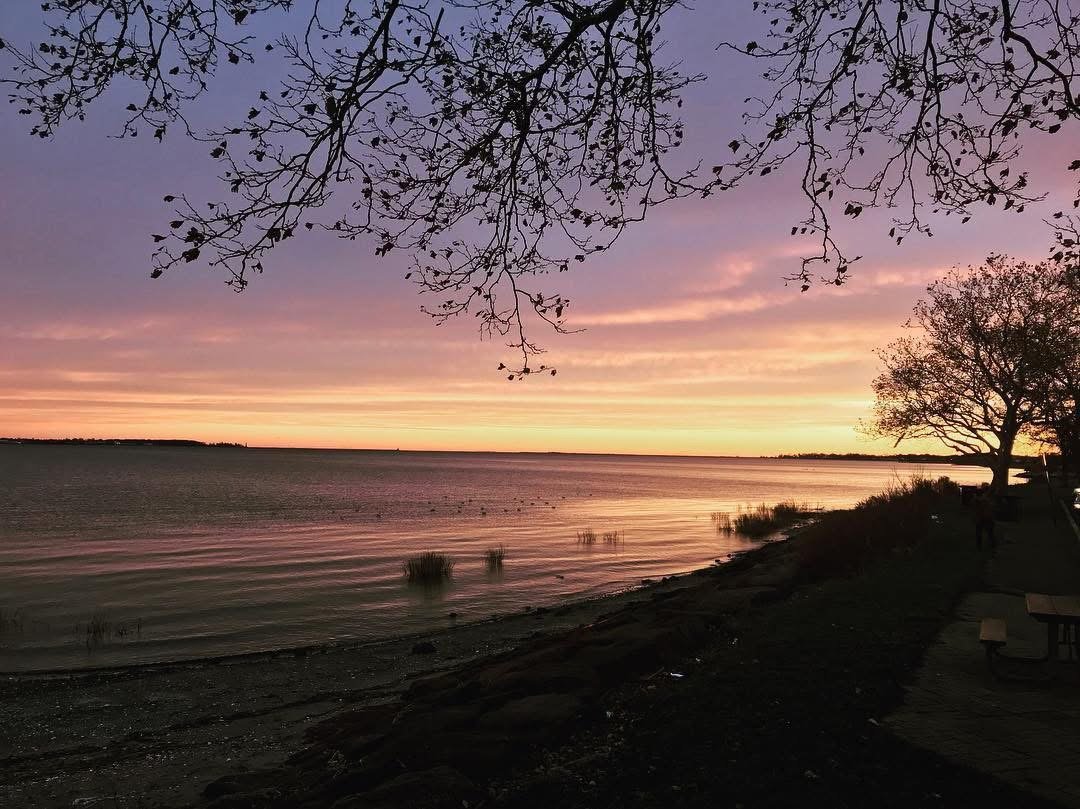 A sunset view of Long Island Sound from New Haven's Long Wharf Drive.
