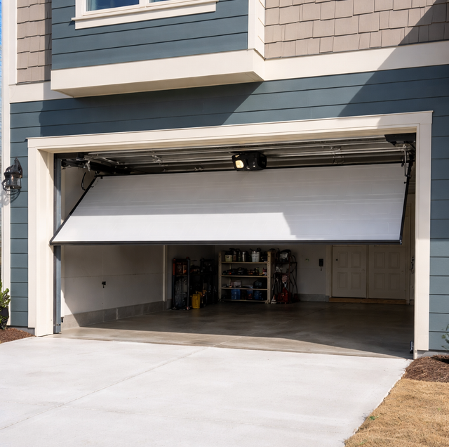 home garage door mid-climb on steel track