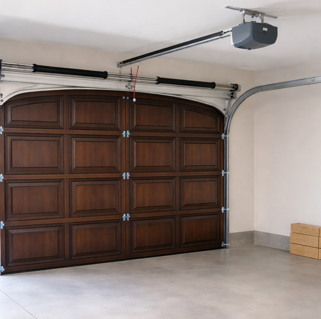 residential garage door stopped mid-open with warped torsion spring
