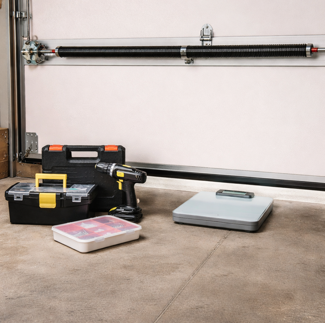 bathroom scale under raised garage door panel