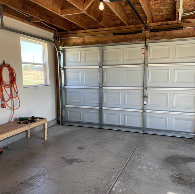 manual garage door opener retrofit with open ceiling joists