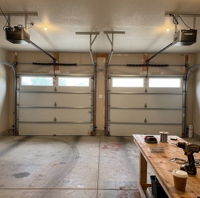 two garage door openers one dead one working