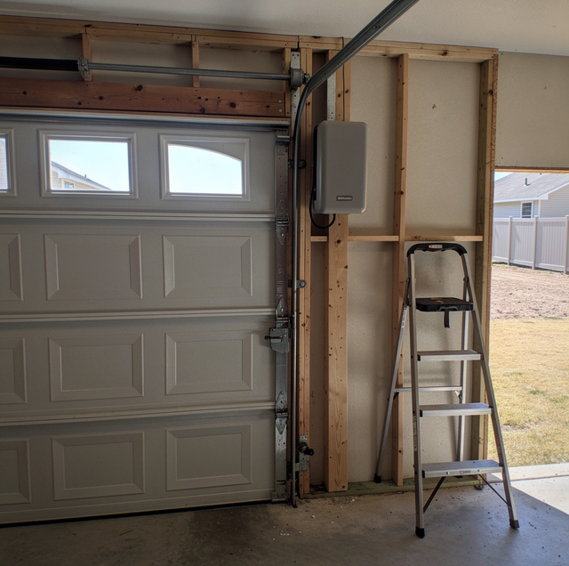 garage ceiling with overhead storage racks and low header