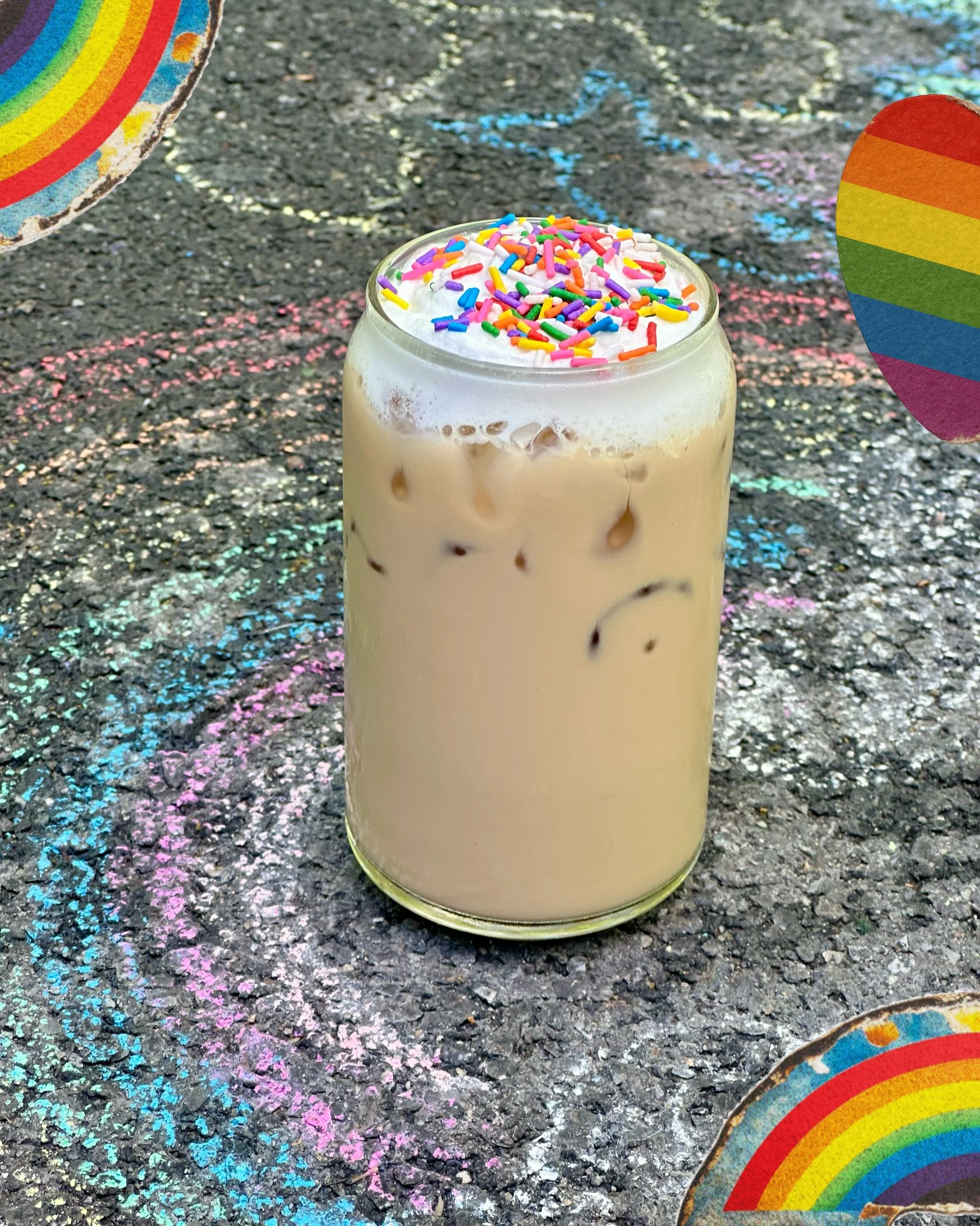 HAPPY PRIDE. First of a few new summer drinks: Rainbow Latte! Double espresso + milk of your choice + almond syrup + birthday cake cold foam + sprinkles. Hot or iced. Come celebrate. 🩷❤️🧡💛💚🩵💙💜