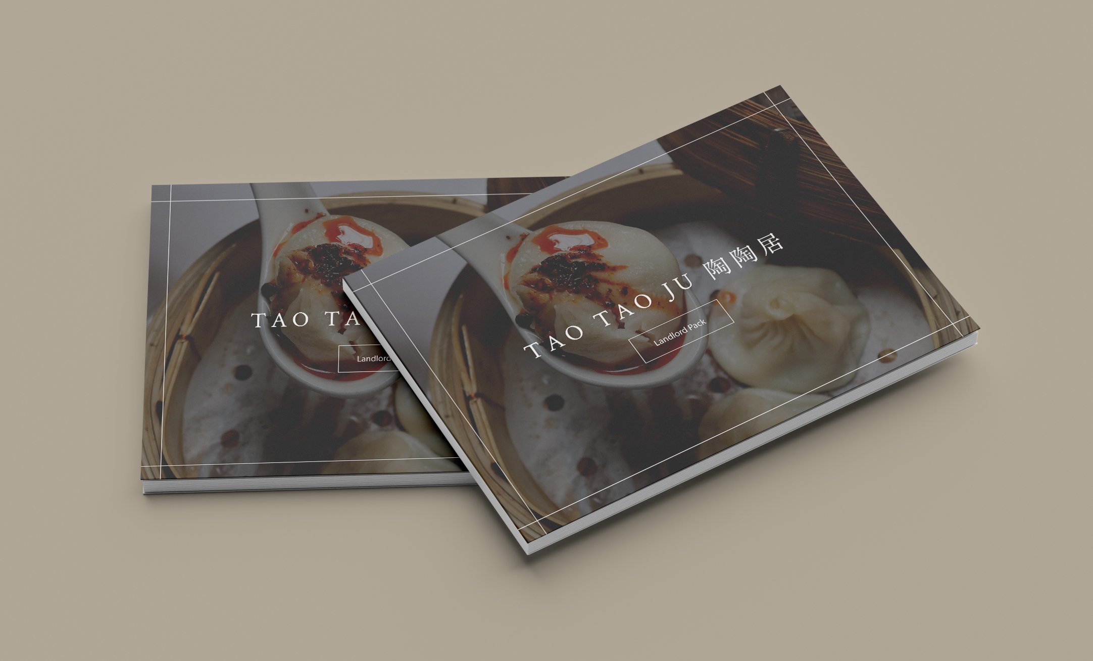 Two restaurant landlord packs titled 'Tao Tao Ju' with a cover featuring Asian dumplings in a bamboo steamer, on a beige surface.