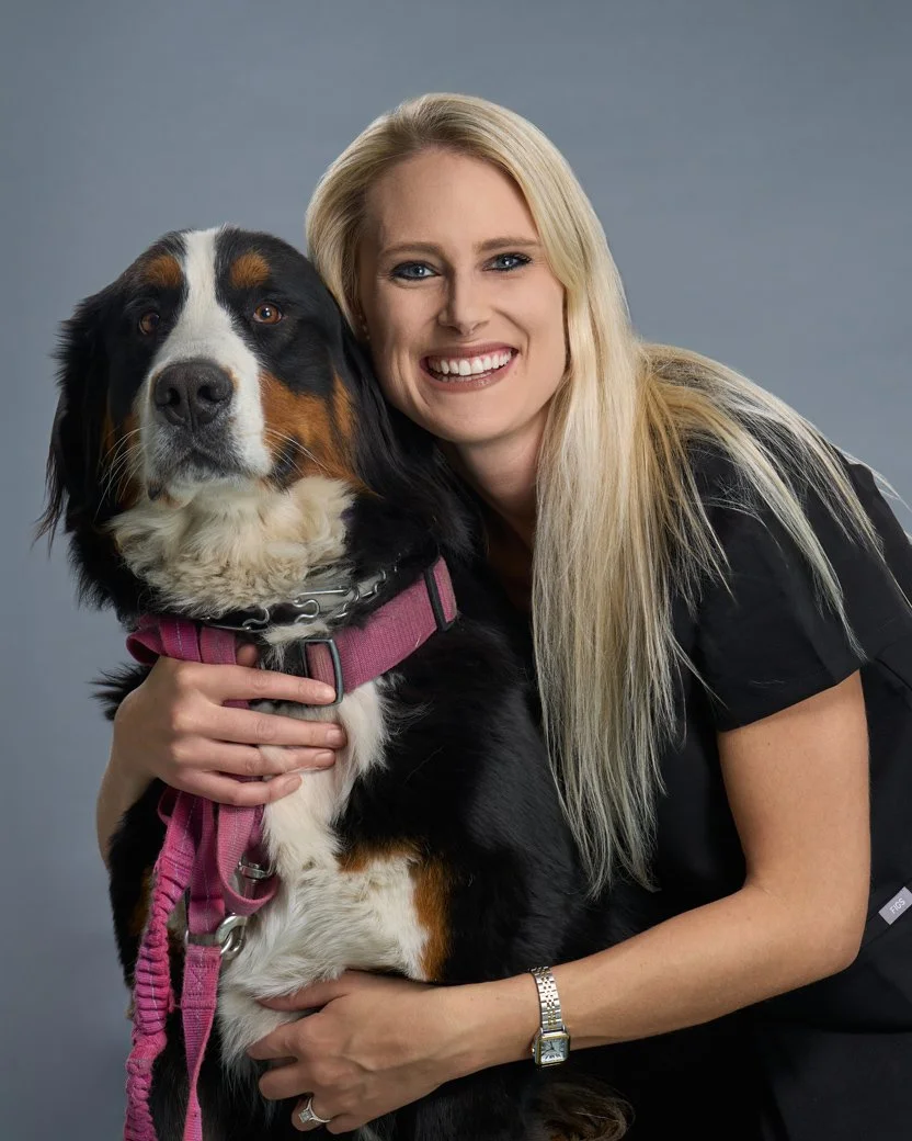Dr. Katy Weber, veterinarian, with her dog